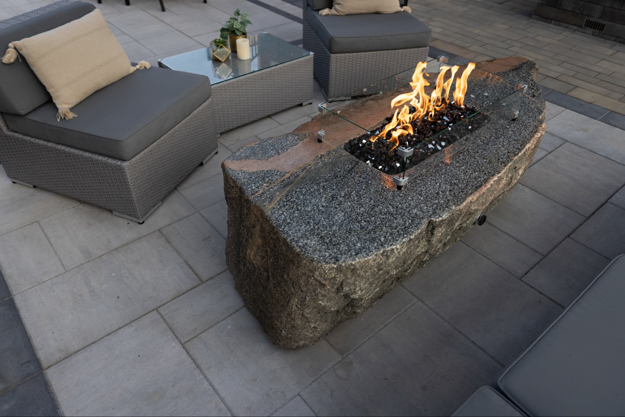 a close-up of a fire table made out of stone