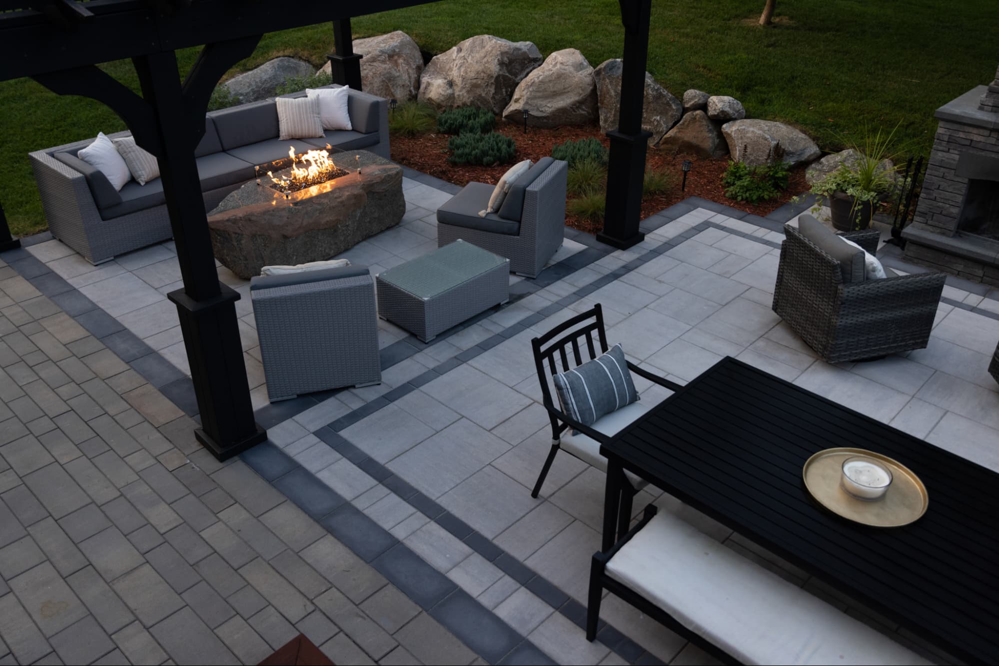 a fire table inside an outdoor living room