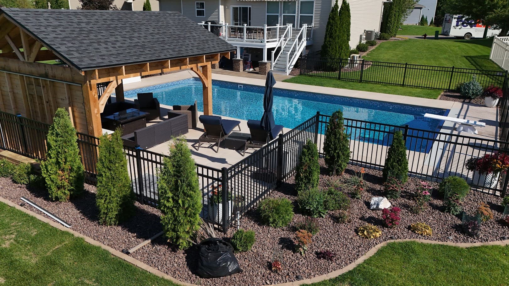 a backyard with a rock garden