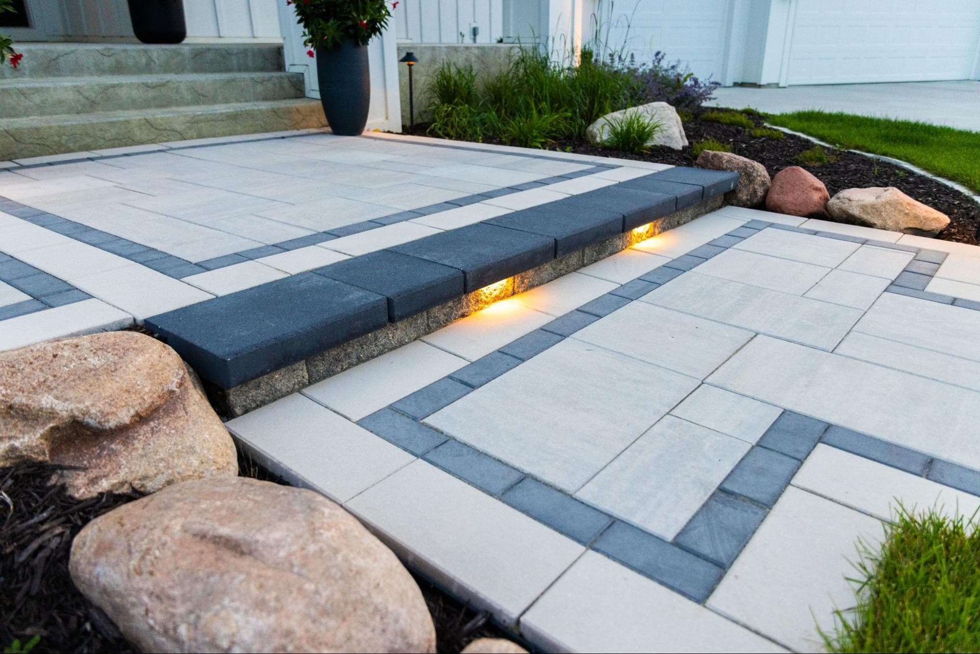 concrete steps with small underlights to illuminate the path.