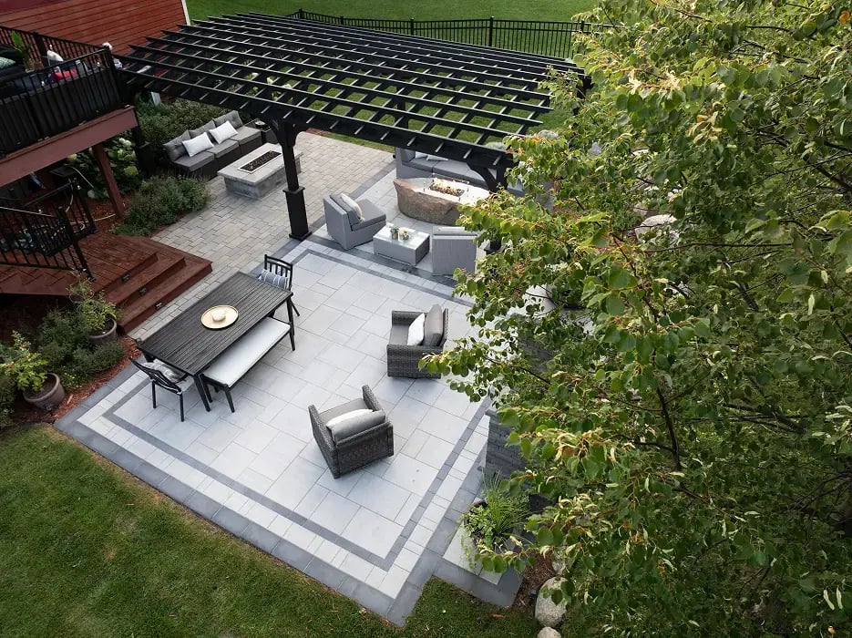 An overhead angle view of a modern patio with furniture on it