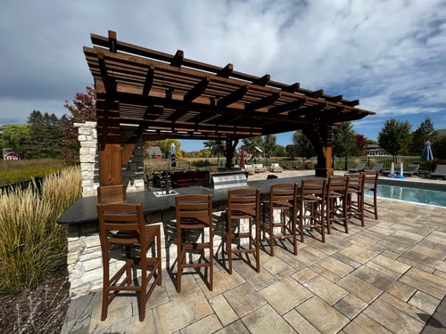 How to Design an Outdoor Kitchen That Works With Your Pool