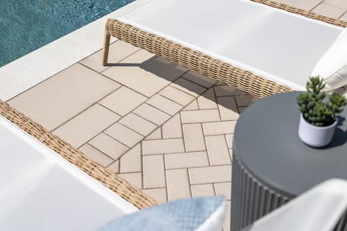 Comparing Pool Deck Materials: Concrete, Natural Stone, and Pavers