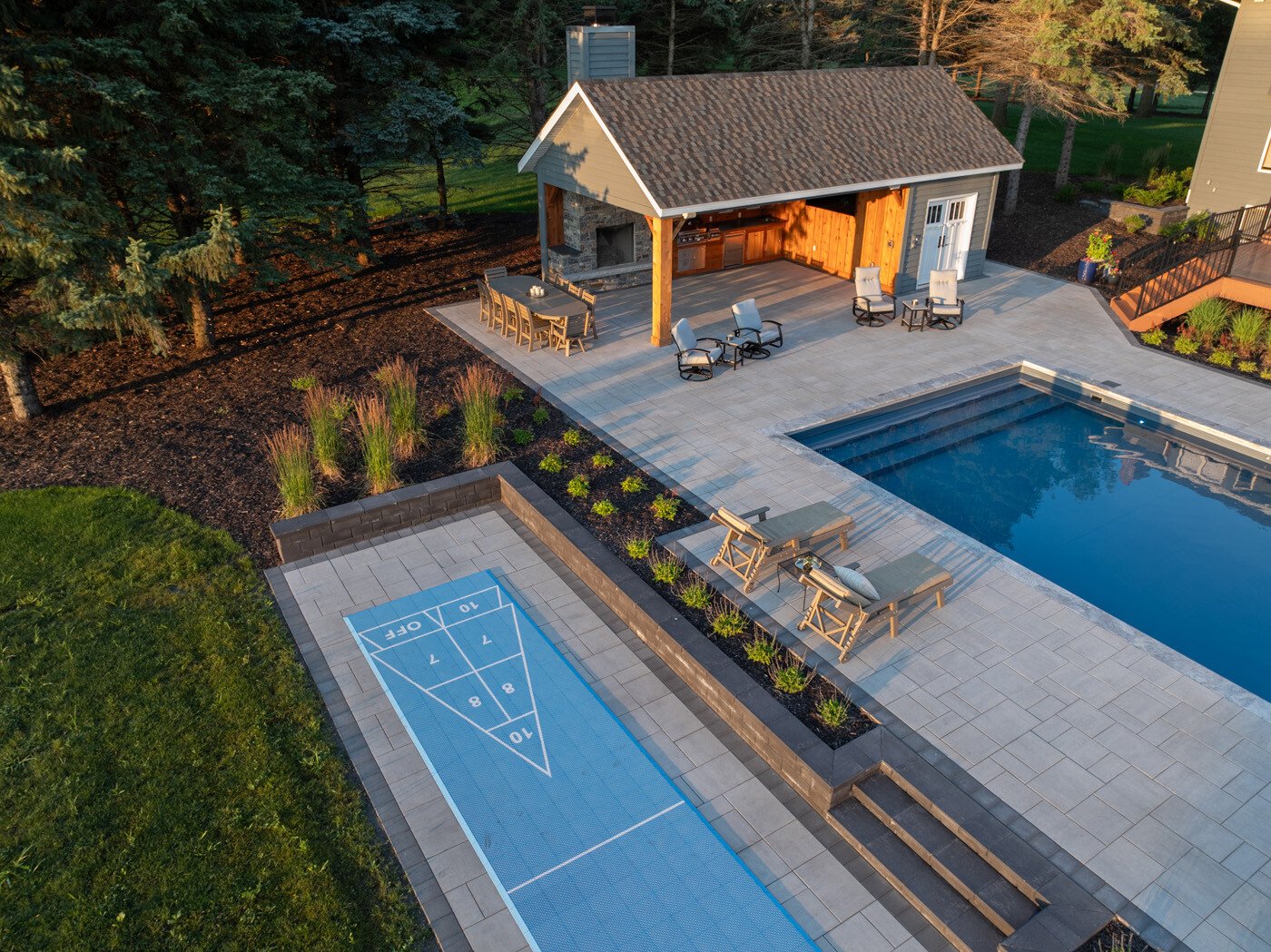 backyard oasis - pergola and pool with shuffle board and patio deck