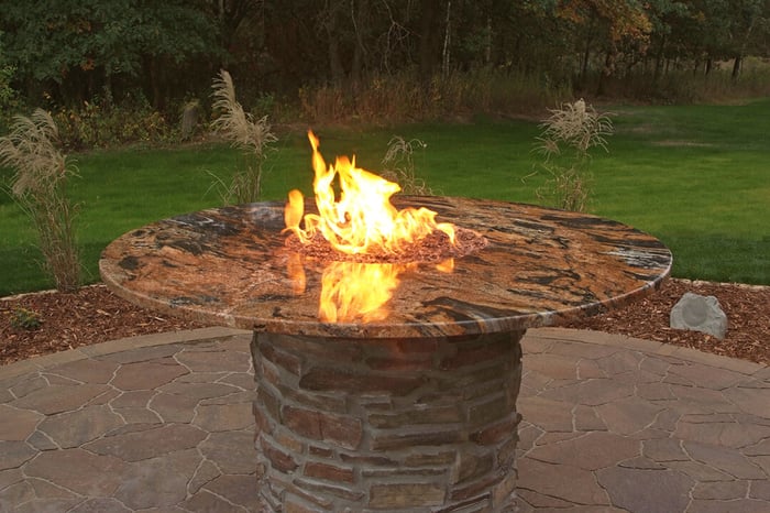a stone fire table